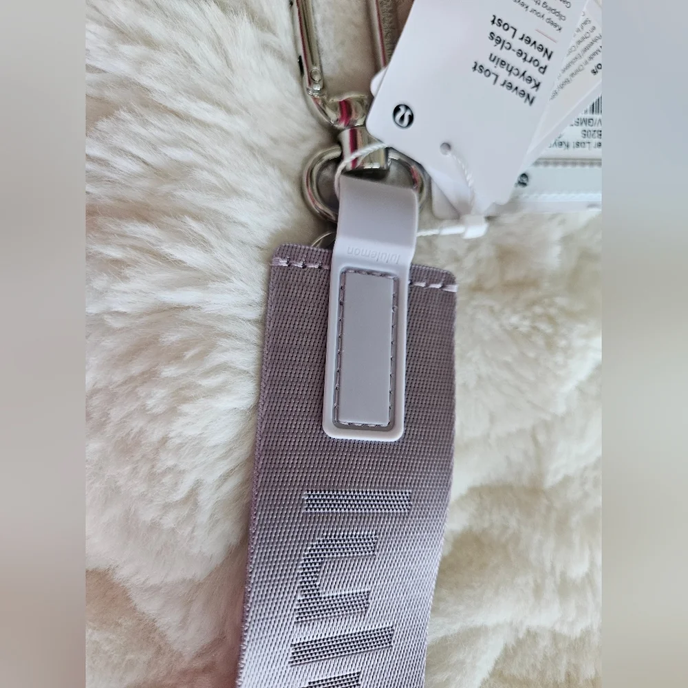 NWT Never Lost Keychain Faint Lavender/Grape Mist